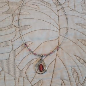 Unique teardrop pink stone and silver necklace.
